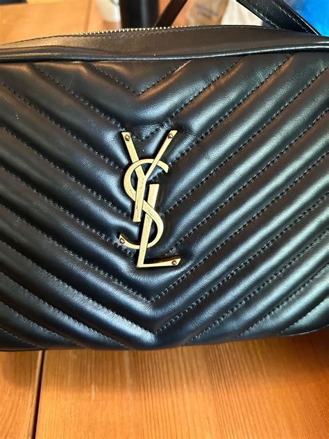 ysl logo scratched|ysl handbag repair.